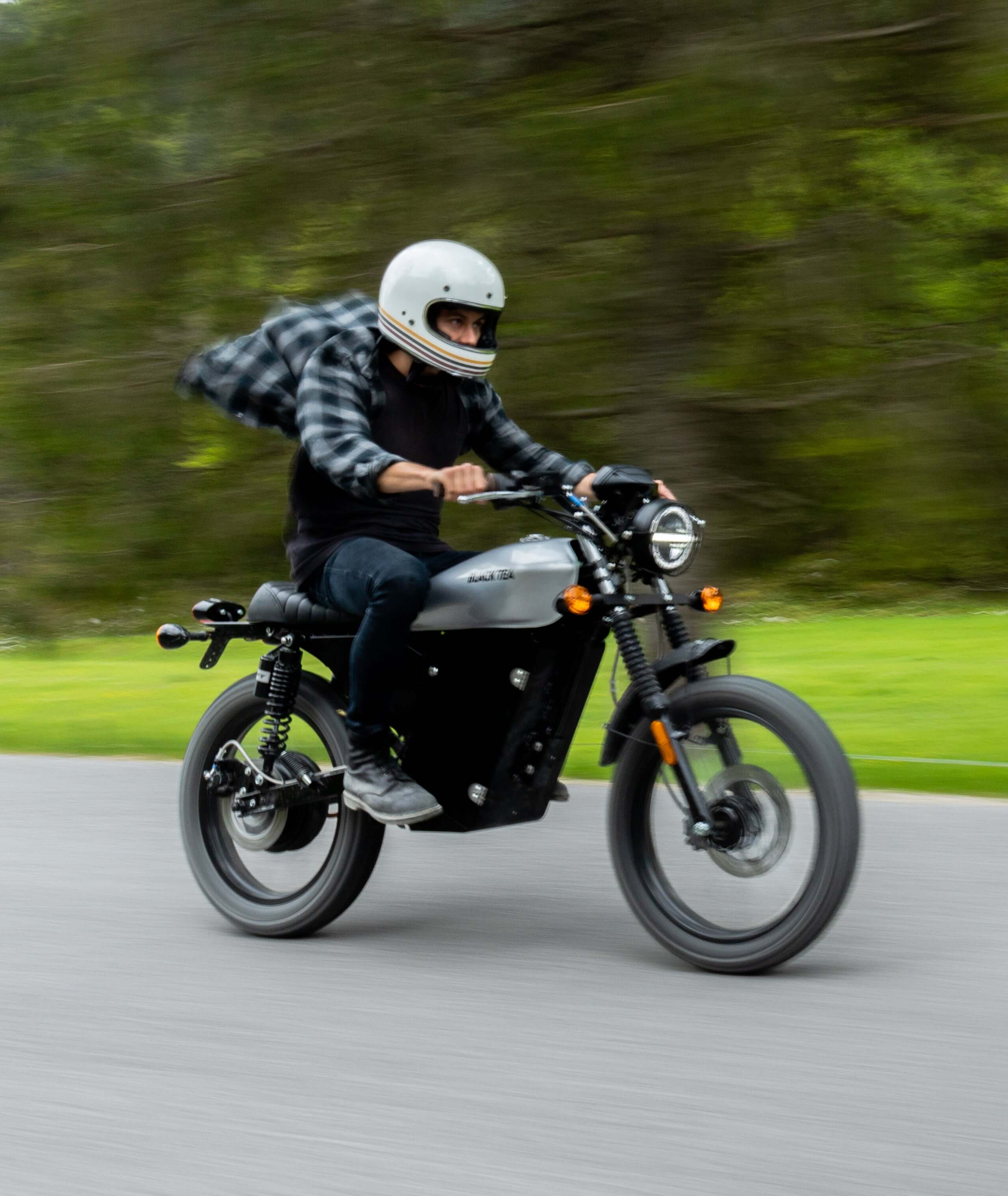 Rider on Electric Motorcycle with vintage Design